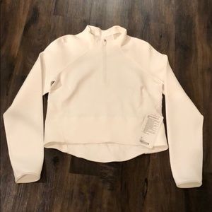 White lululemon kicking asphalt 1/2 zip crop